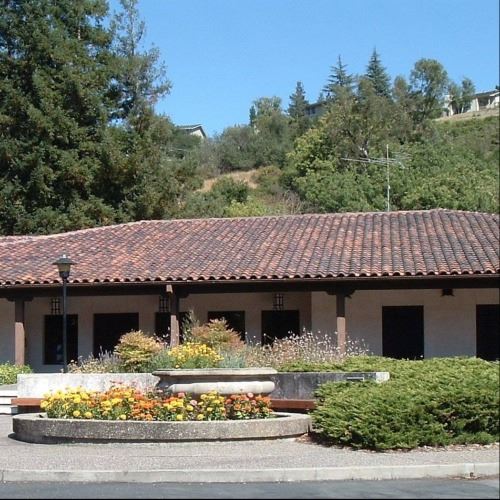 The exterior of the Moraga Library, taken from the parking lot on a sunny day 