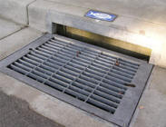 Storm Drain Covered by a Metal Grate